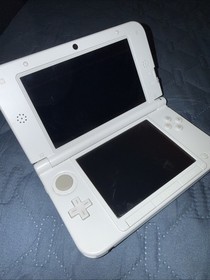 Nintendo 3DS XL Pink And White Handheld W/ Charger Pokemon Virtual Console Games