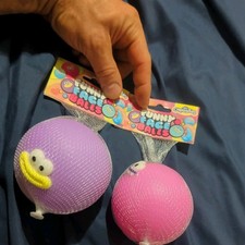 Orb Curiosities Funny Face Balls Squishy Purple, Pink Viral - Set Of 2