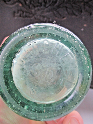 ER i  Writing says “trademark registered, bottle pat. D - 105529” and