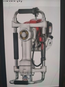 Rhino metal post driver Honda GX35 4 cycle gas engine.