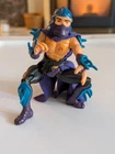 1988 Playmates Teenage Mutant Ninja Turtles Shredder action figure.