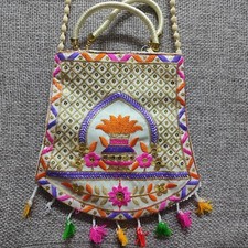 Intricately Designed Handcrafted Embroidered Bag with Traditional Motifs