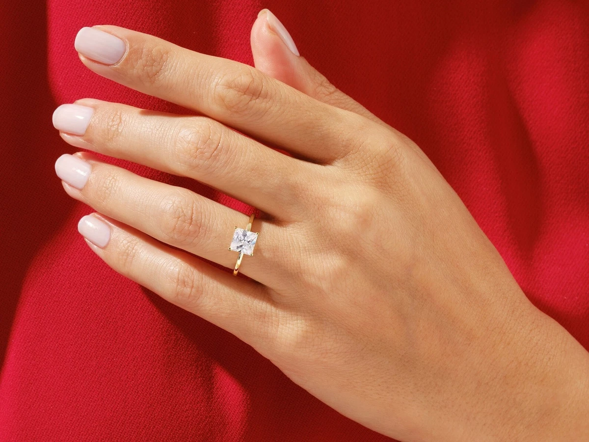 A beautiful wedding ring on her hand.AI generative 30801099 Stock Photo at  Vecteezy