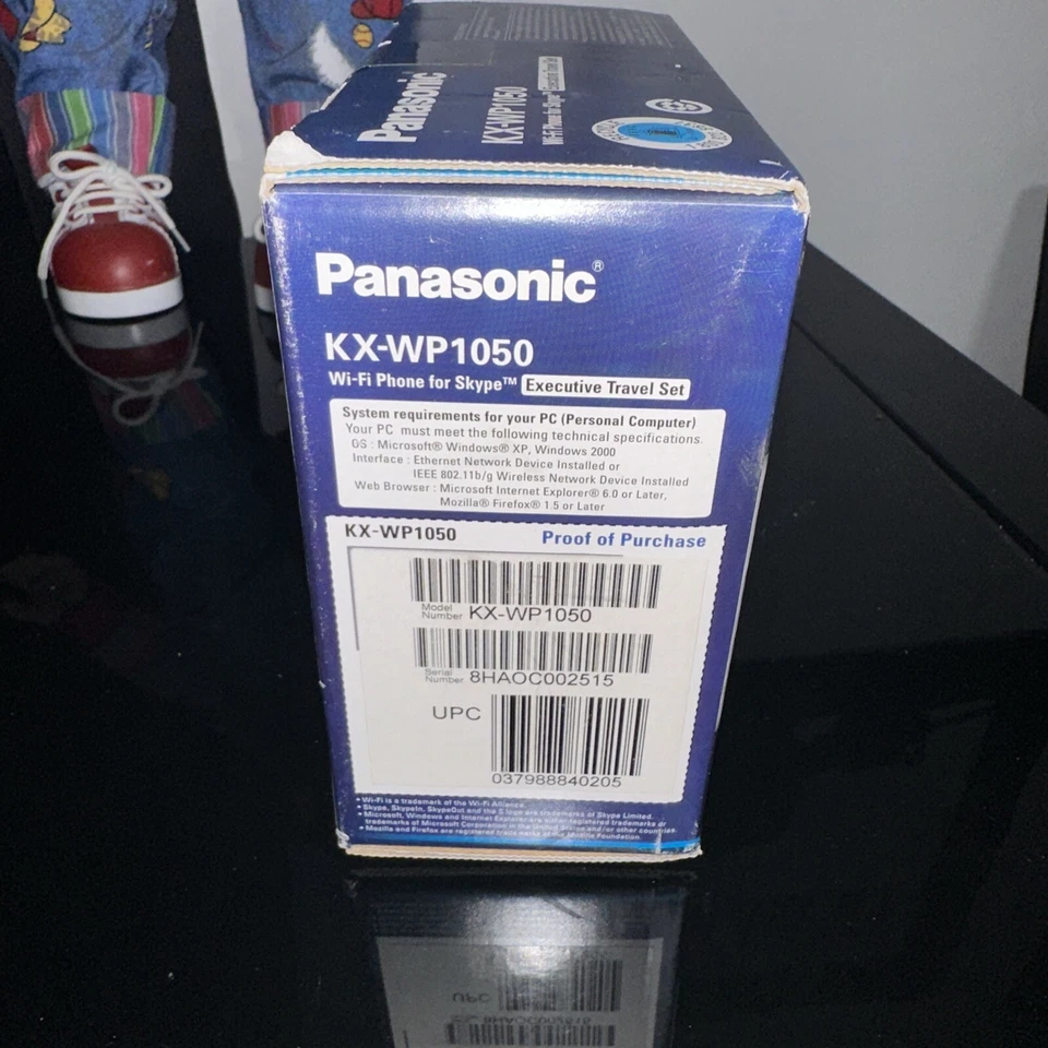 Teléfono Panasonic Wi-Fi con enrutador de viaje y estuche Skype International KX-WP1050 Foto 2 de 4