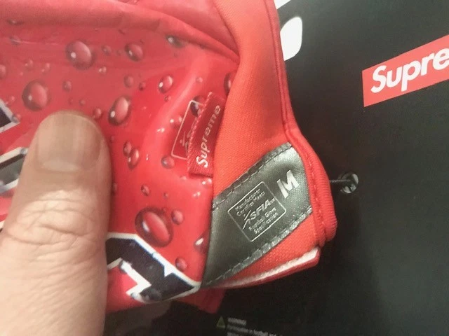 supreme gloves football