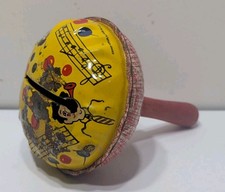 VINTAGE Tin Noise Maker Rattle with Wood Handle Clown Theme Kirchhof Newark NJ