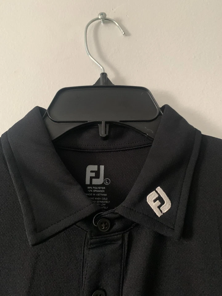 Polo de golf Footjoy elástico piqué liso negro talla L, XL NUEVO CON ETIQUETAS Foto 3 de 4