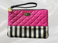Luv Betsey by Betsey Johnson striped and quilted clutch wristlet.