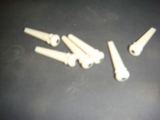 Fender Cream colored acoustic guitar plastic bridge pins set of 6