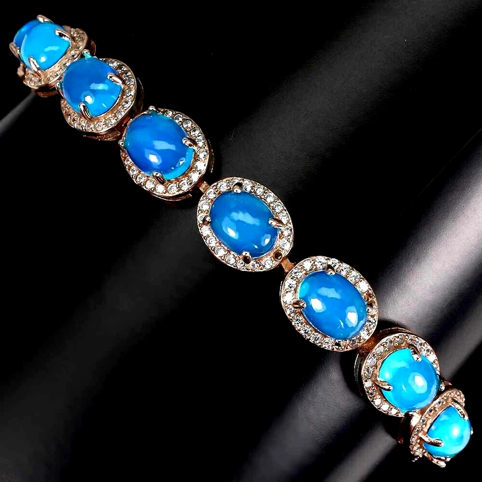 PULSERA ÓPALO DE FUEGO AZUL CON DETALLES DE CIRCONITA BLANCA PLATA DE LEY 925 14K RGP 7 IN Foto 2 de 3