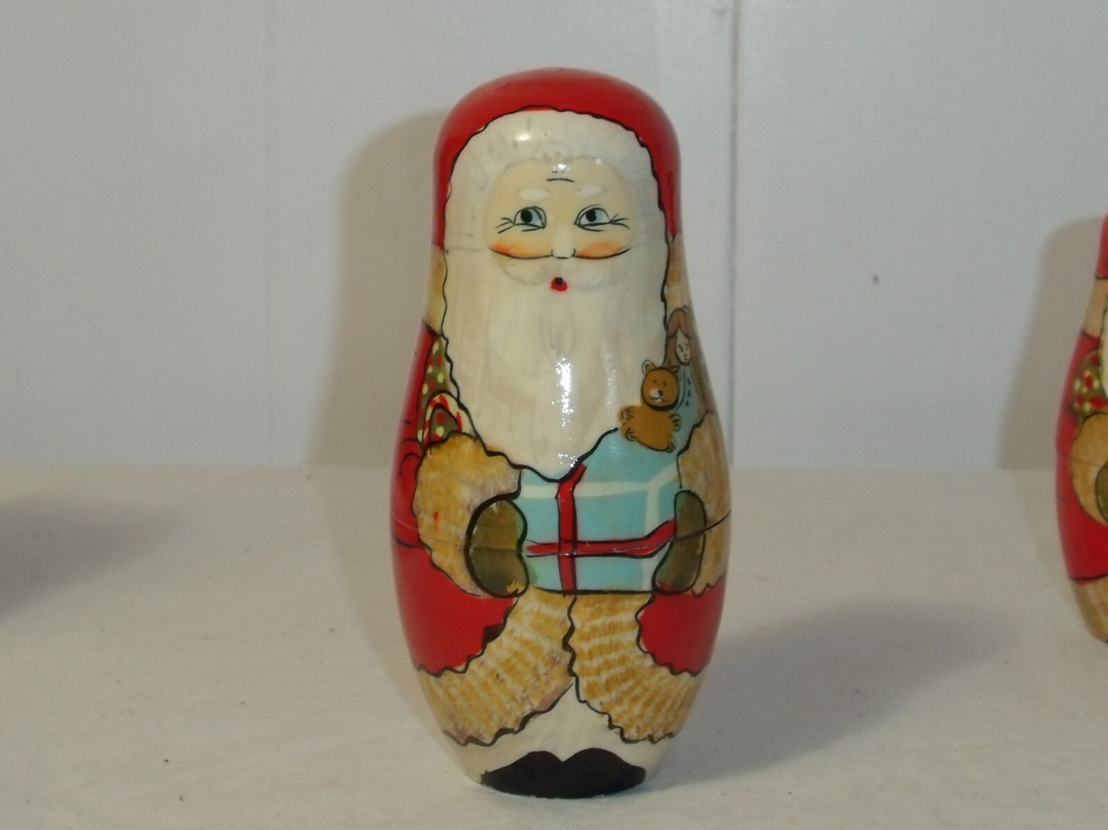 Vintage Wooden Santa Nesting Dolls SET OF 6 Pre OwnedSanta Holding
