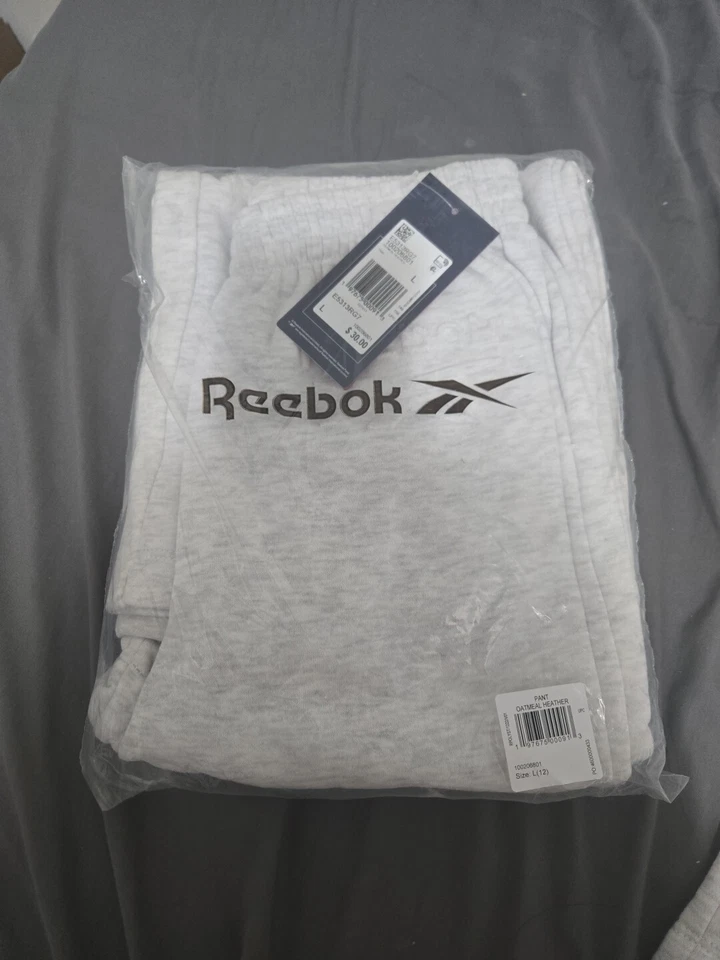 Pantalones deportivos grises grandes (12) nuevos para niños. Reebok. Con etiquetas Foto 2 de 2