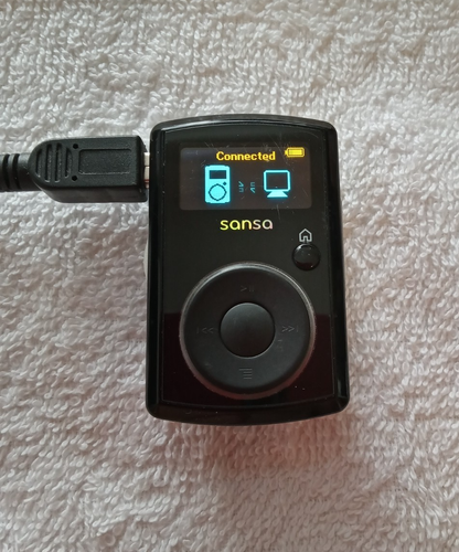 Lecteur MP3 SanDisk Sansa Express 2 Go - Noir SDMX7-2048-A18 - NEUF Avec Bande