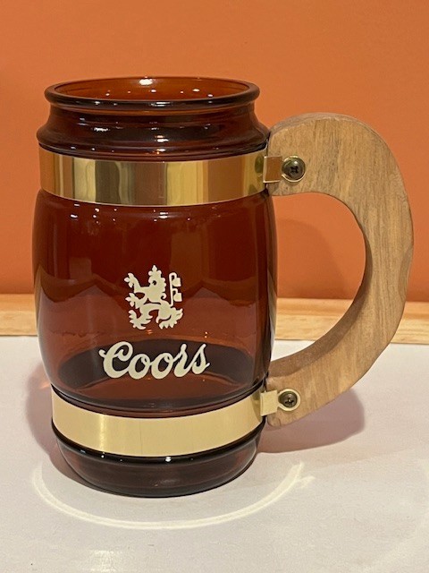 Vintage Siesta Ware mug. Brown glass with Coors logo on one side. 5" tall