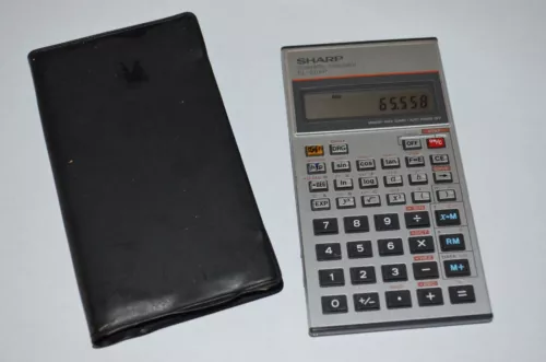 Ancienne Calculatrice Sharp EL 506 P + étui