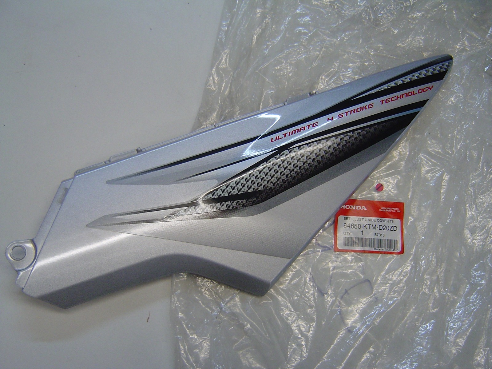 Cache latéral gauche ANF125 en ABS protecteur anti-vibrations