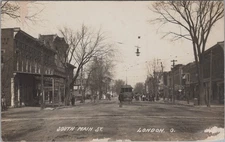 South Main Street London Ohio Trolley Street Light Stores 1909 RPPC Postcard