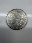 1878-CC Morgan Silver Dollar - Solid AU details 1st-year from Carson City mint