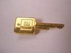 Miniature GM Ignition Key ROCHESTER PRODUCTS Vintage Tie Tack Lapel Pin e43