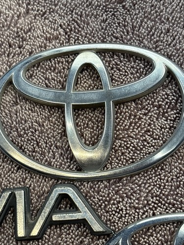 Toyota Previa Emblems Used (3) ** NEEDS NEW ADHESIVE TO INSTALL ** - Picture 12 of 17