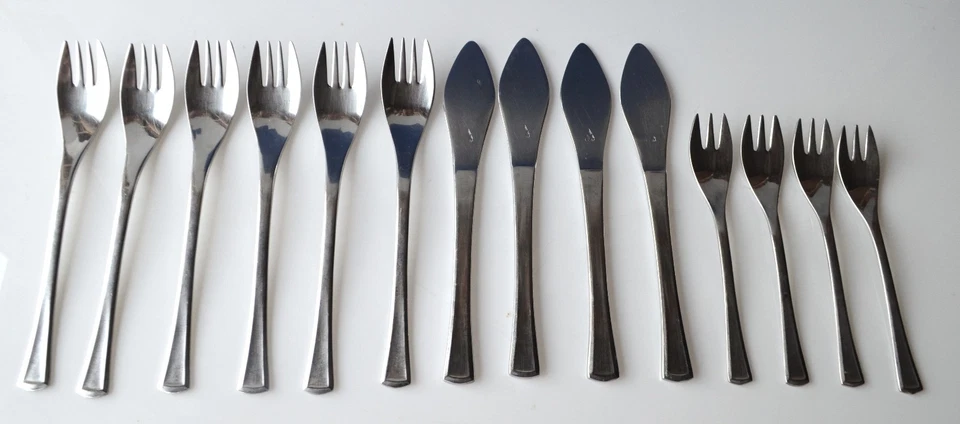 14 Teile innovatives Besteckset ELYPSIS AMC Schweiz 4 Messer 6 Gabeln 4 Kucheng. - Bild 1 von 1