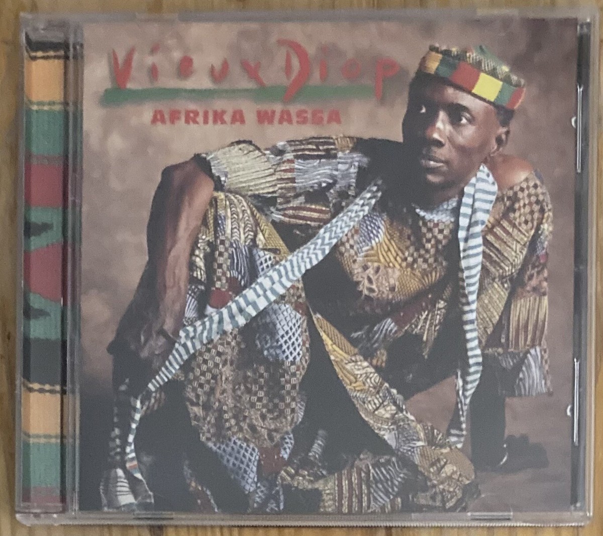 Vieux Diop Afrika Wassa CD 2000 Triloka Records CD Hole Punch to