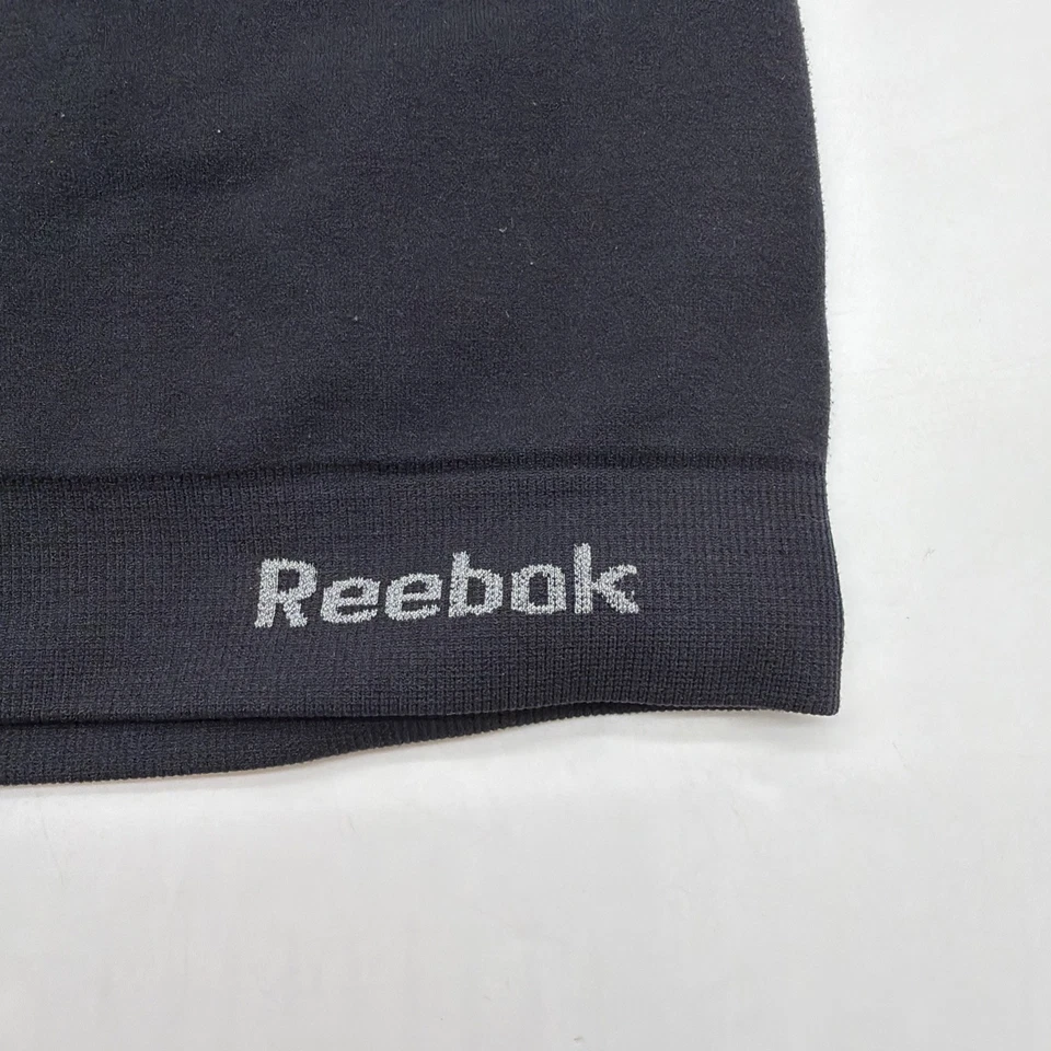 Sujetador deportivo Reebok para mujer mediano con logotipo negro. #37636 Foto 2 de 4
