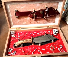 Pirate type saber knife with sheath in a box setup. Damascus steel.