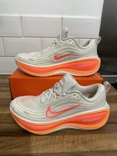 Nike Vomero Plus running shoes in the Sail/White/Orange Pulse/Hot Lava Size 6.5.