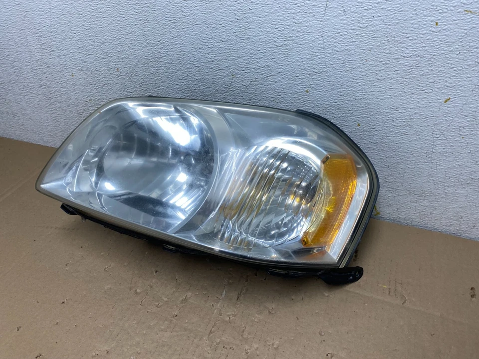 Faro halógeno izquierdo conductor Mazda Tribute 2005-2006 OEM N2283 DW Foto 2 de 4