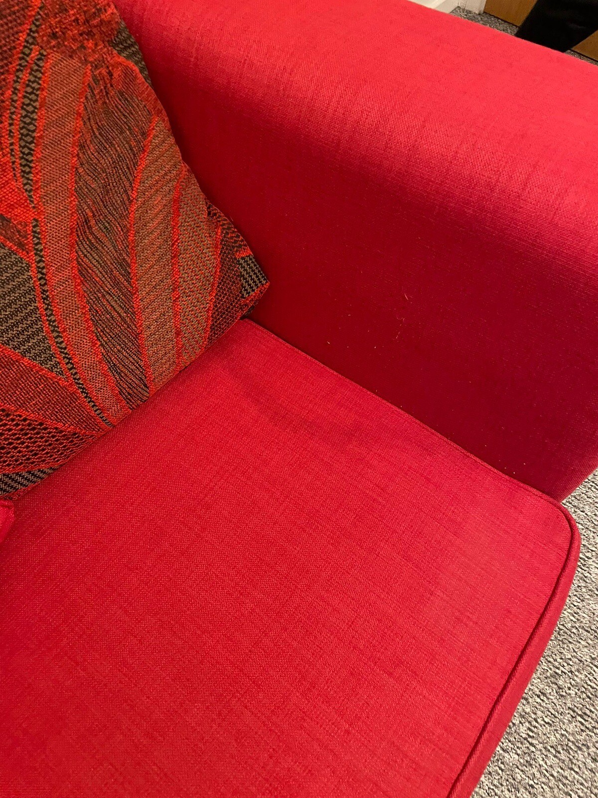 Comfy Red Sofa Bed, used but good condition. Used as a spare in office