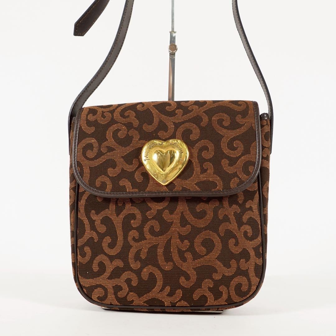 Borsa a tracolla YVES SAINT LAURENT a forma di cuore accessori in metallo arabesco donna