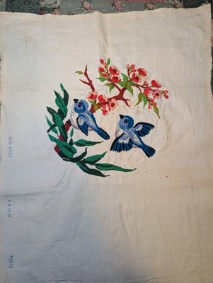 Vintage Caron brand embroidery piece features blue birds perched on a flower