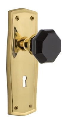 Nostalgic Warehouse Polished Brass Prairie Plate Keyhole Black Knob Passage Set - Image 1 of 4