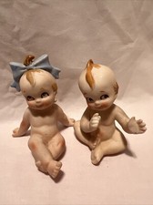 Set 2 Made In Japan Bisque Kewpie Dolls Blue Bow  Sitting Arms Out Approx. 3  T
