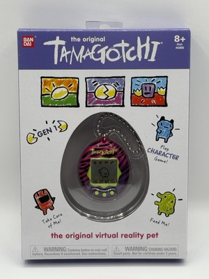 Tamagotchi Pink w Zebra Stripes Electronic Virtual Reality Pet 1.5'' Bandai Gen 2