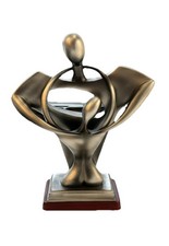 Lovers Sculpture Figure on wooden base. 28cm high x 21.5 wide 