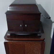 Old crank RCA Victrola  player with cabinet and lots of records two items