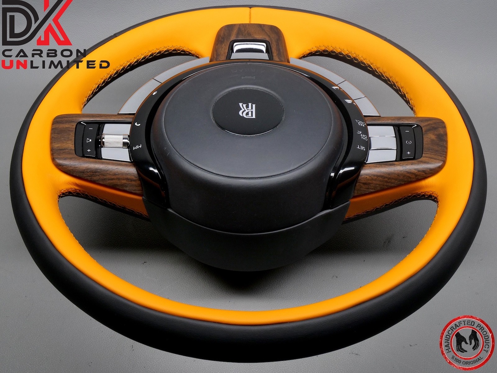 Rolls Royce Spectre Thick Rimmed Two Tone Black & Mandarin Stitch Steering Wheel