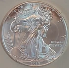 2015 AMERICAN SILVER EAGLE DOLLAR COIN 1 OZ. 999 PURE FINE SILVER. Lightly Toned