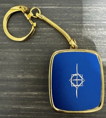 Vintage Sankyo Music Box Keychain with a geometric symbol - Wind Up Working