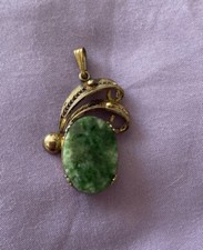 Dije Sorrento de plata de ley de España con piedra verde.