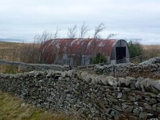 Photo A1 Nissen hut behind dry stone walls Twiston On Twiston Moor. Pres c2013