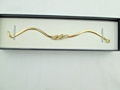1986 SPARKLE TWIST Bracelet by AVON 6.5  Rein stones Gold Tone