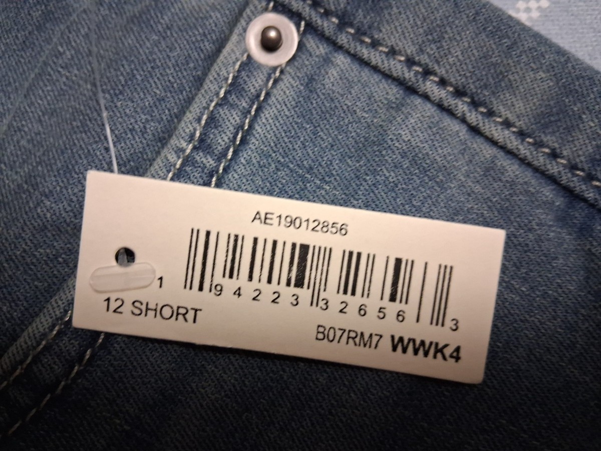 Amazon Essentials Women's Mid-Rise Stretchy Skinny Jeans 12 SHORT LT Blue Bleach View 6