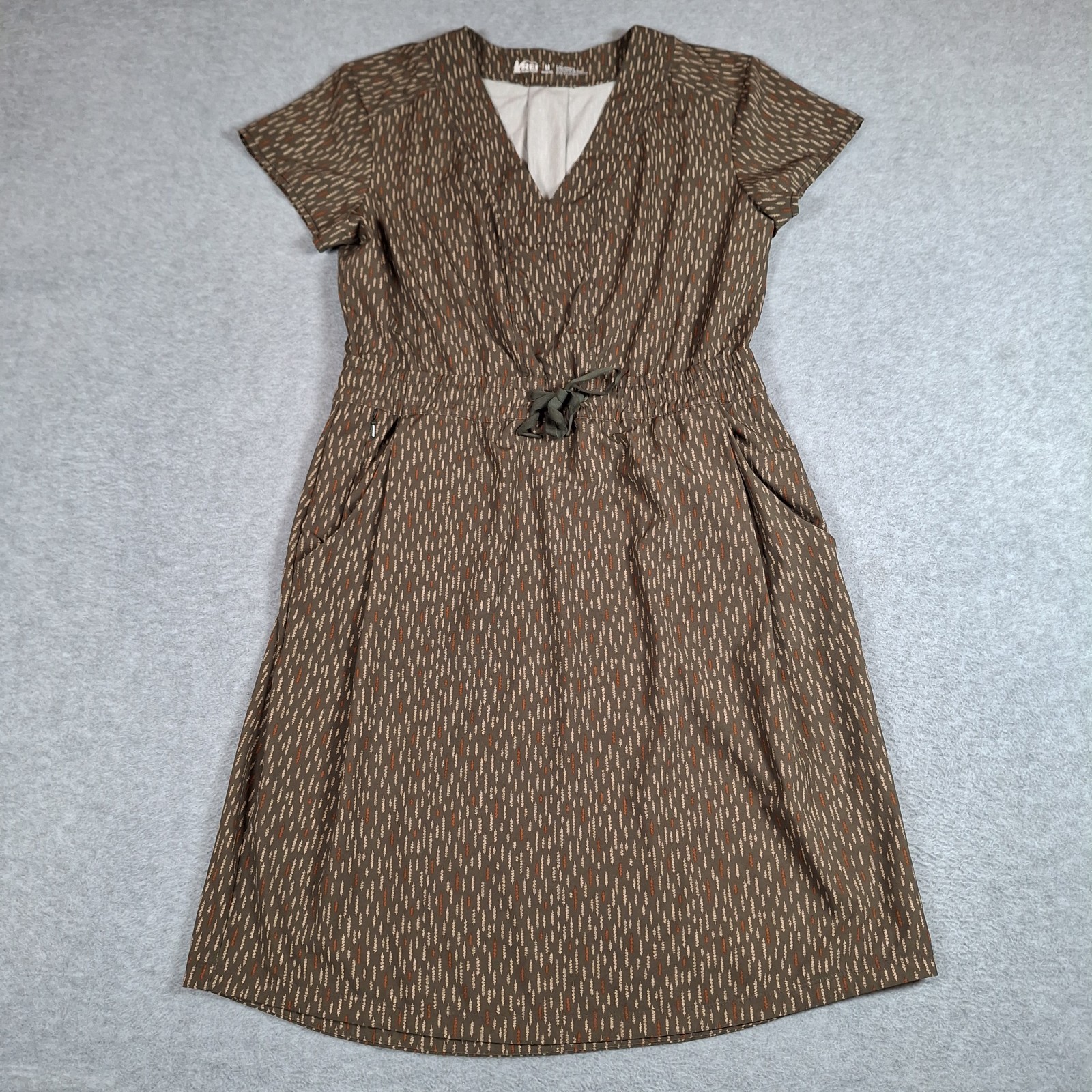 REI Co Op Aoraki Travel Dress Medium Olive Green V Neck Stretch Pockets Outdoor