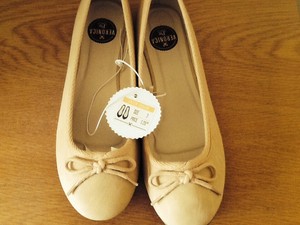cream ballerina pumps