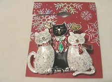 NEW SILVER TONE, BLACK AND WHITE CAT THEMED PIN
