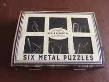 Instytut Gier i Puzzle - SZEŚĆ METALOWYCH PUZZLI