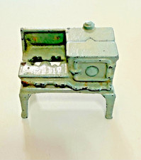 Vintage doll house cast iron miniature stove.